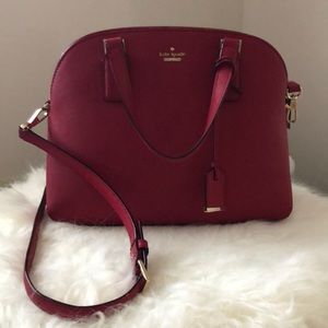 Red Kate spade handbag with long strap